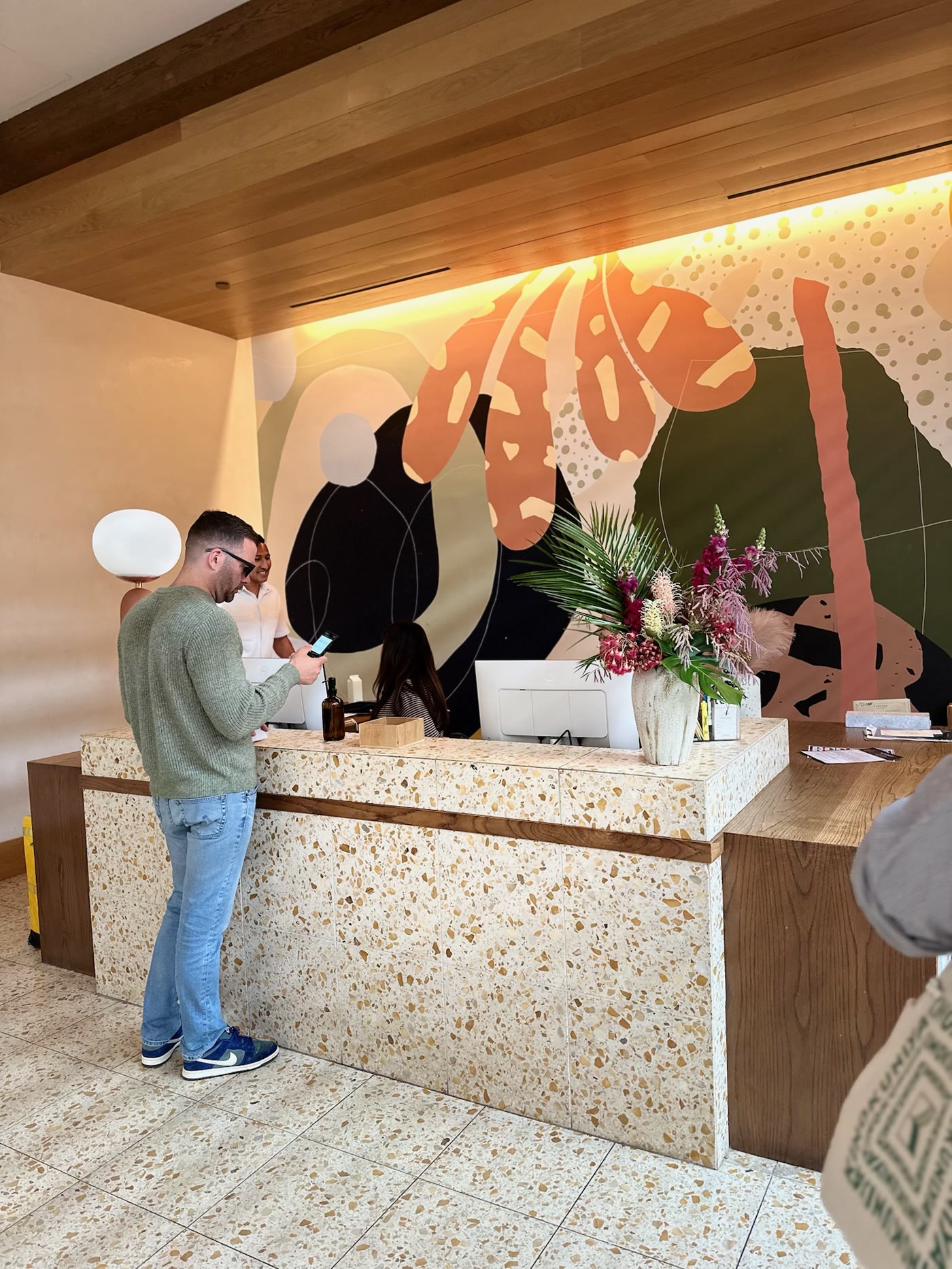 Florals at the terrazzo host counter
