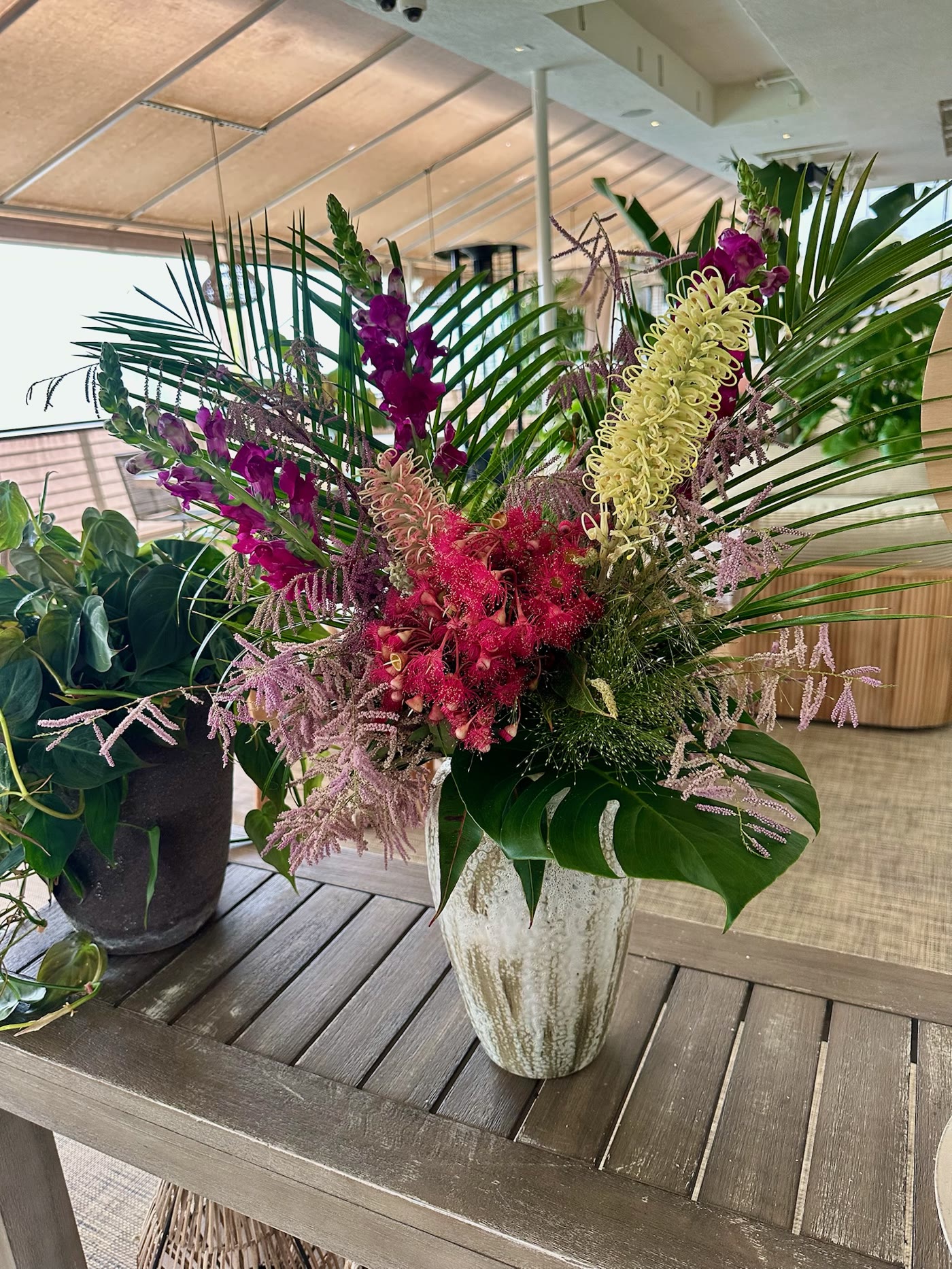 Tropical floral arrangement in the dining room